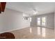 Bright living room with tile floors, fireplace and sliding glass doors at 4538 W Sierra St, Glendale, AZ 85304