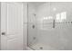 Shower with glass enclosure and tiled walls at 4538 W Sierra St, Glendale, AZ 85304