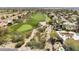 Golf course community overview, showcasing the lush green fairways and surrounding homes at 4602 E Monte Way, Phoenix, AZ 85044