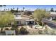 Aerial view of a charming home with a private backyard, featuring a spa and patio at 4602 E Monte Way, Phoenix, AZ 85044