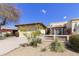 Front view of a lovely home with a well-maintained yard and desert landscaping at 4602 E Monte Way, Phoenix, AZ 85044