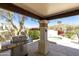 Covered patio with a built-in grill, and a view of the spa at 4602 E Monte Way, Phoenix, AZ 85044