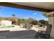 Covered patio with a spa, outdoor seating, and mountain views at 4602 E Monte Way, Phoenix, AZ 85044