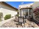 Another view of the inviting patio area with a table and chairs at 4602 E Monte Way, Phoenix, AZ 85044