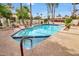 Inviting community pool with a spa and plenty of lounge chairs at 4602 E Monte Way, Phoenix, AZ 85044