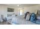 Bright bedroom with king-size bed and access to the kitchen at 5132 N 31St Way # 147, Phoenix, AZ 85016