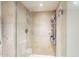 Large walk-in shower with glass enclosure and tile surround at 5132 N 31St Way # 147, Phoenix, AZ 85016