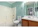 Bathroom features a shower/tub combo and wood vanity at 521 W Jardin Loop, Casa Grande, AZ 85122