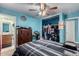 Spacious bedroom with large closet and ceiling fan at 521 W Jardin Loop, Casa Grande, AZ 85122