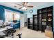 Bedroom with a desk, shelving and ceiling fan at 521 W Jardin Loop, Casa Grande, AZ 85122