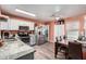 Kitchen with granite countertops and stainless steel appliances at 521 W Jardin Loop, Casa Grande, AZ 85122