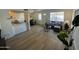 Bright living room with gray sectional sofa and modern coffee table at 5238 Nw 42Nd Ln, Phoenix, AZ 85019