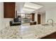 Granite countertops and stainless steel appliances in this kitchen at 534 S Palo Verde Way, Mesa, AZ 85208