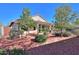 Landscaped backyard with a covered patio at 5491 W Pueblo Dr, Eloy, AZ 85131