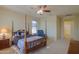 Bedroom with a post bed and ceiling fan at 5491 W Pueblo Dr, Eloy, AZ 85131