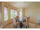 Charming dining area with a glass table and four chairs at 5491 W Pueblo Dr, Eloy, AZ 85131