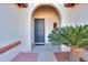 Front entry with arched doorway and tile flooring at 5491 W Pueblo Dr, Eloy, AZ 85131