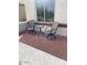 Small patio with brick pavers and two chairs at 5491 W Pueblo Dr, Eloy, AZ 85131