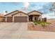 Beautiful two-car garage home with a landscaped yard at 5711 W Lydia Ln, Laveen, AZ 85339