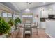 Kitchen features a breakfast nook and white cabinetry at 5711 W Lydia Ln, Laveen, AZ 85339