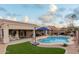 Beautiful backyard oasis with a sparkling pool at 5711 W Lydia Ln, Laveen, AZ 85339