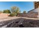 Large backyard with a rock garden and block wall at 604 W Emerald Ave, Mesa, AZ 85210