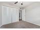 Bedroom with double door closet and carpeted floor at 604 W Emerald Ave, Mesa, AZ 85210