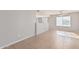 Dining area with tile flooring and adjacent kitchen at 604 W Emerald Ave, Mesa, AZ 85210