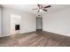 Living room with hardwood floors and open kitchen view at 604 W Emerald Ave, Mesa, AZ 85210