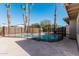 Inviting swimming pool with safety fence at 604 W Emerald Ave, Mesa, AZ 85210