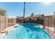 Relaxing kidney shaped pool in sunny backyard at 604 W Emerald Ave, Mesa, AZ 85210