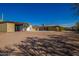 Aerial view showing home, detached workshop and surrounding landscape at 617 S Camino Saguaro --, Apache Junction, AZ 85119