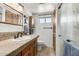 Bathroom with walk-in shower and tile flooring at 617 S Camino Saguaro --, Apache Junction, AZ 85119