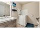 Bathroom with walk-in tub and modern vanity at 617 S Camino Saguaro --, Apache Junction, AZ 85119