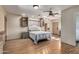 Bedroom with wood flooring and ceiling fan at 617 S Camino Saguaro --, Apache Junction, AZ 85119