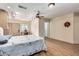 Bedroom with wood flooring and a ceiling fan at 617 S Camino Saguaro --, Apache Junction, AZ 85119