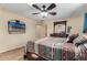 Bedroom with wood flooring and a ceiling fan at 617 S Camino Saguaro --, Apache Junction, AZ 85119