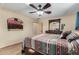 Spacious bedroom with wood floors and a large bed at 617 S Camino Saguaro --, Apache Junction, AZ 85119