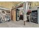 Organized garage with a dartboard and workbench at 617 S Camino Saguaro --, Apache Junction, AZ 85119