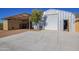 Large metal garage with attached covered parking at 617 S Camino Saguaro --, Apache Junction, AZ 85119