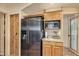 Kitchen features stainless steel appliances and wood cabinets at 617 S Camino Saguaro --, Apache Junction, AZ 85119