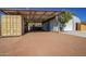 Covered storage area with shipping container and surfboard storage at 617 S Camino Saguaro --, Apache Junction, AZ 85119