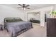 Bright bedroom with mirrored closet and ceiling fan at 6602 W Desert Cove Ave, Glendale, AZ 85304