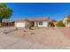 Single-story home with a desert landscape and cacti at 6602 W Desert Cove Ave, Glendale, AZ 85304