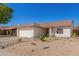 Single story home with desert landscaping and a two car garage at 6602 W Desert Cove Ave, Glendale, AZ 85304