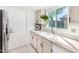 Clean and bright kitchen with updated countertops and sink at 6602 W Desert Cove Ave, Glendale, AZ 85304