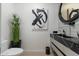 Elegant bathroom with black marble vanity and modern fixtures at 7180 E Kierland Blvd # 1116, Scottsdale, AZ 85254