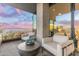 Outdoor patio with seating area and city views at sunset at 7180 E Kierland Blvd # 1116, Scottsdale, AZ 85254