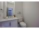 Clean and modern powder room with white vanity at 8136 E Beardsley Rd, Scottsdale, AZ 85255