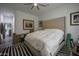 Spacious bedroom with plush bedding and large headboard at 8136 E Beardsley Rd, Scottsdale, AZ 85255